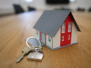 A house miniature and keys
