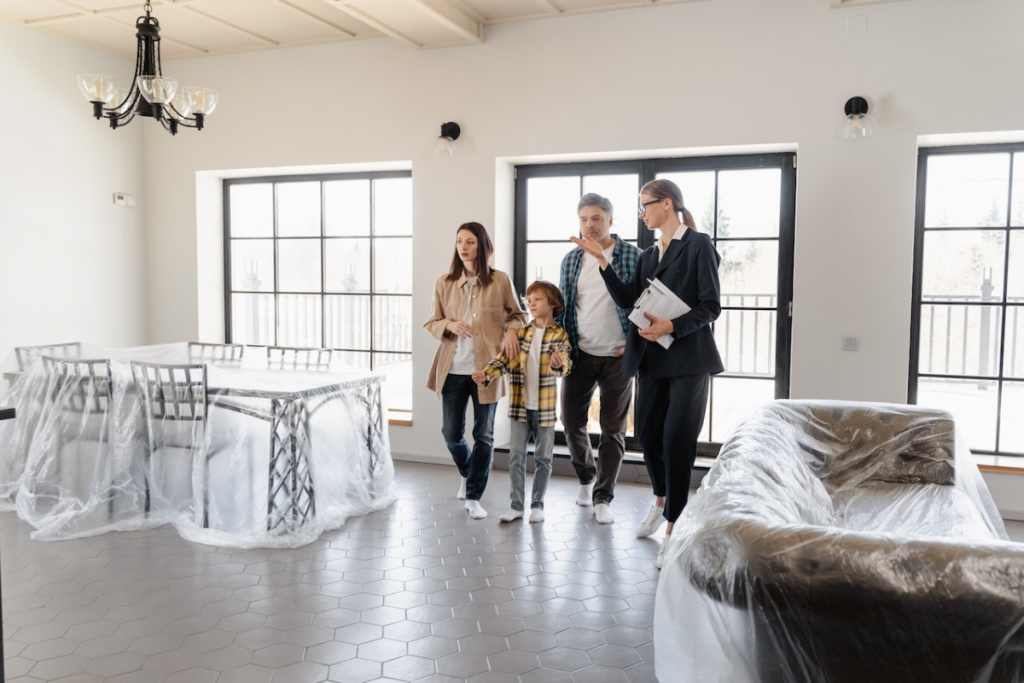 Homeowners walking through a Berwyn or Cicero, IL home during an early selling conversation