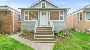 Berwyn, IL home exterior representing a homeowner deciding whether to sell this year or wait