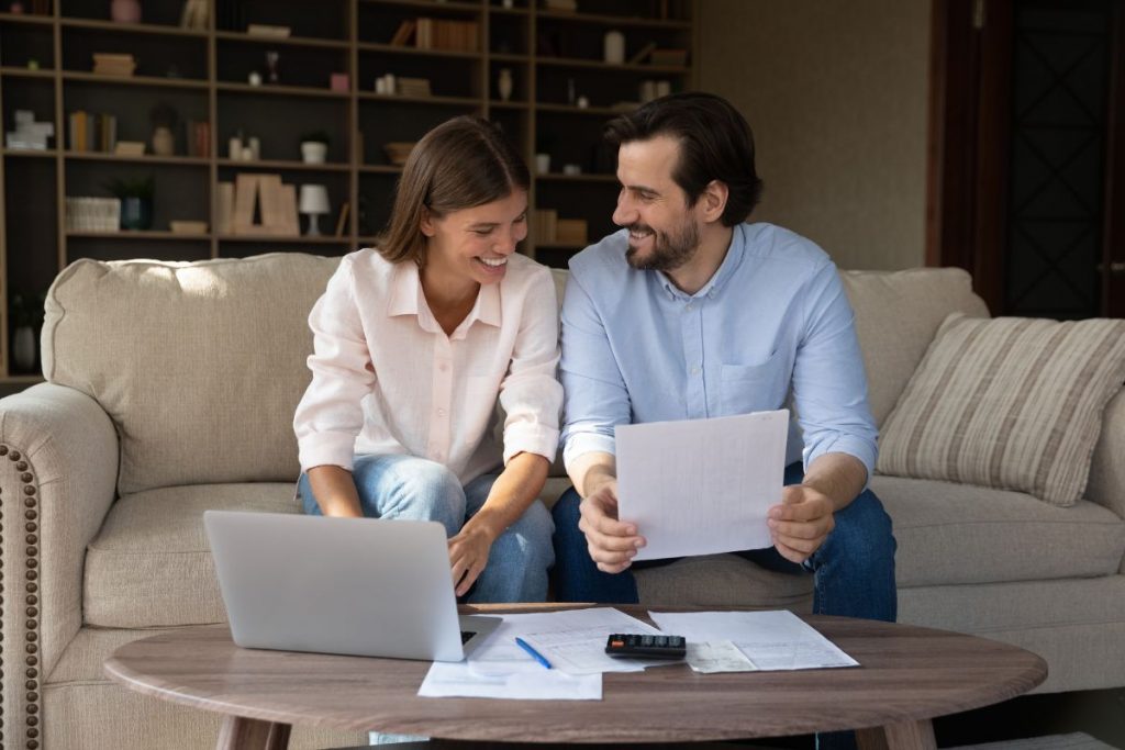 Cicero, IL homeowner reviewing paperwork at home while considering selling this year