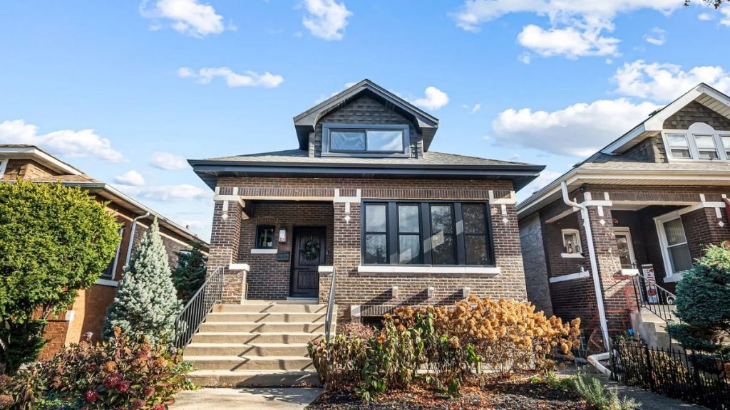 Residential street in Cicero, IL with brick homes and sidewalks