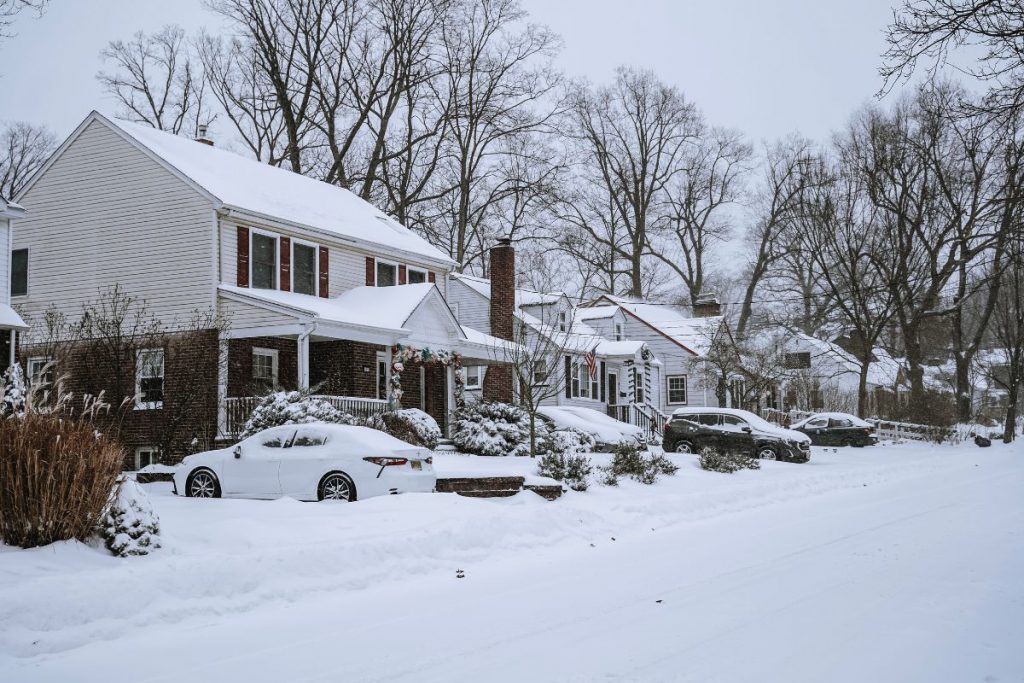 Quiet residential street in Cicero, IL with sidewalks and parked cars