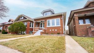 Cicero, IL residential street with brick homes and mature trees