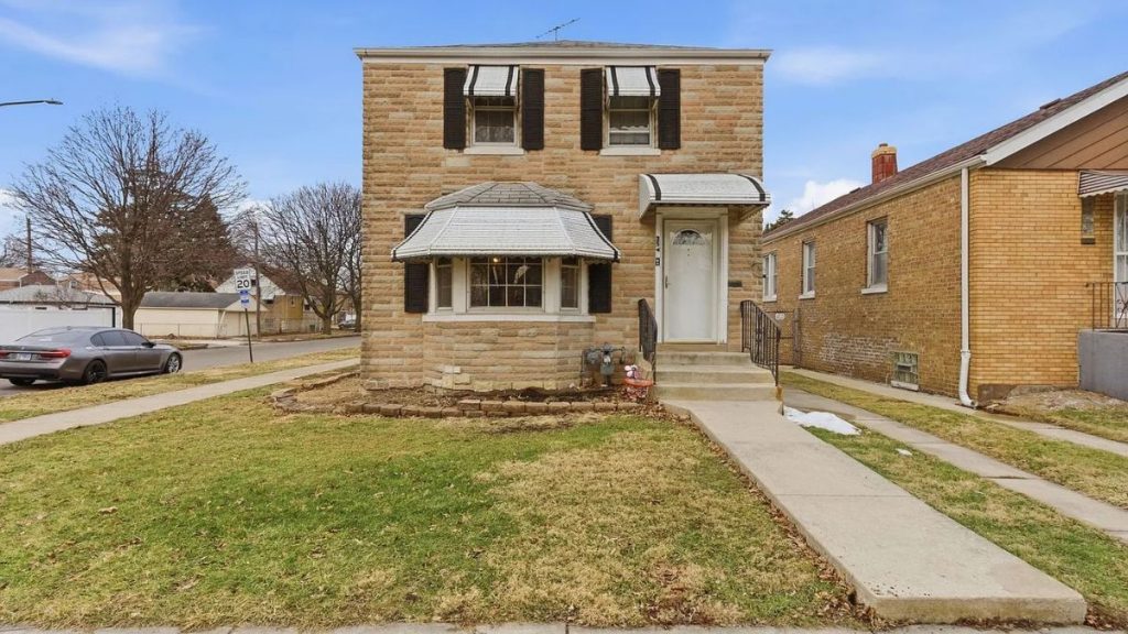 Front exterior of 3546 S 56th Ct in Cicero IL brick corner-lot home