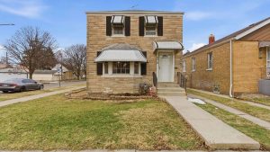 Front exterior of 3546 S 56th Ct in Cicero IL brick corner-lot home
