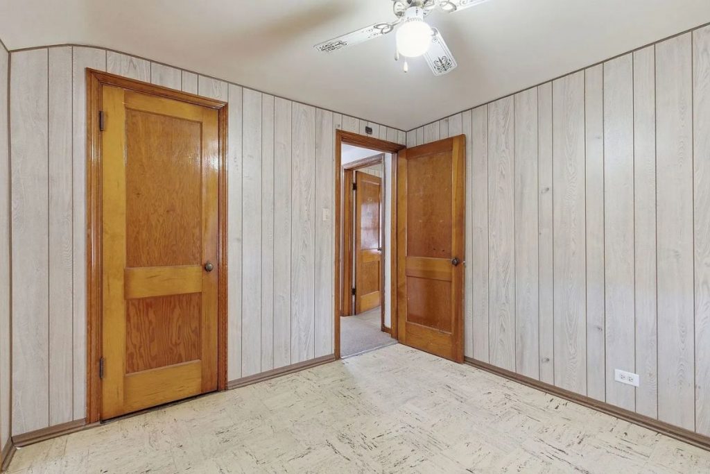 Second-level connected rooms at 3546 S 56th Ct in Cicero IL showing traditional doorways and layout