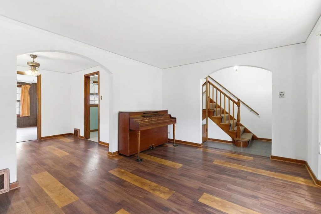 First-floor living area at 3546 S 56th Ct in Cicero IL showing how the space connects to the stairs