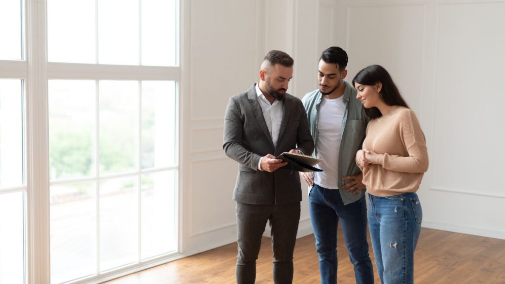 Realtor consulting with homeowners about seller preparation in Berwyn and Cicero