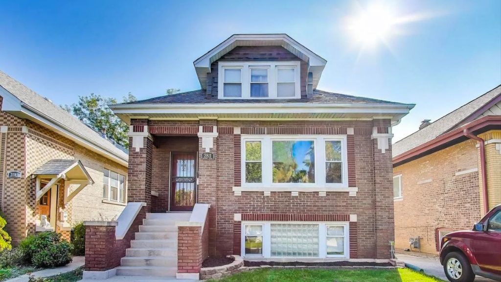 neighbor sold berwyn cicero home with sold sign on residential street