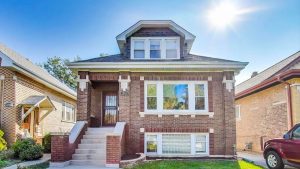 neighbor sold berwyn cicero home with sold sign on residential street