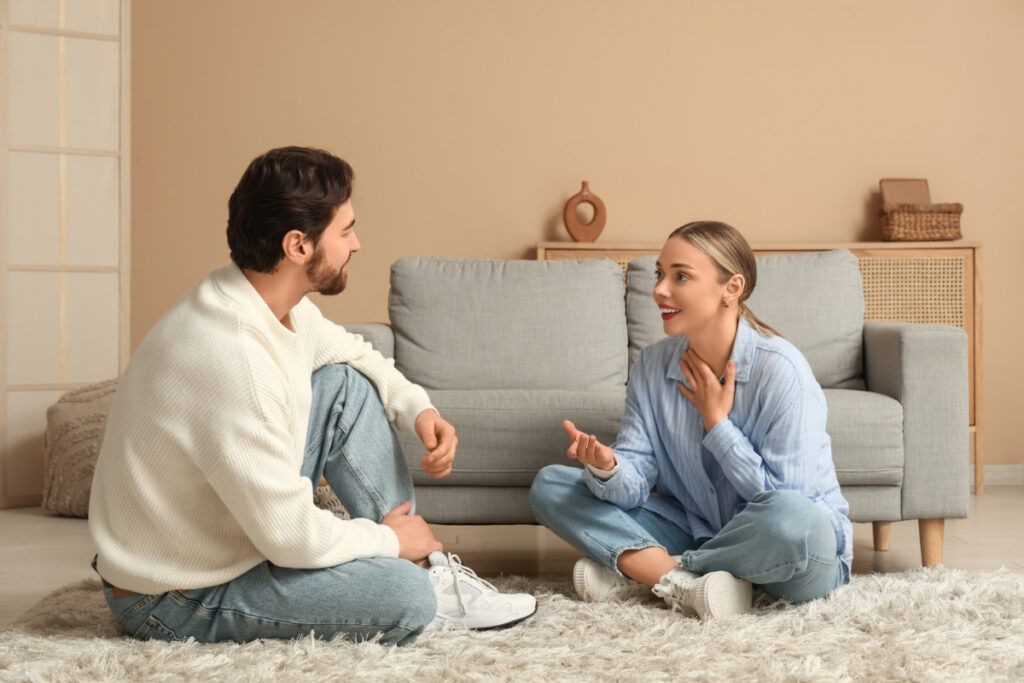 Couple discussing whether to sell their Cicero home