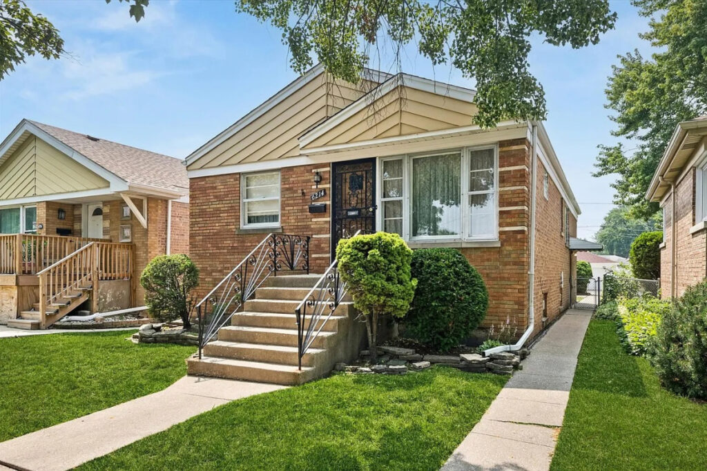 Homeowner evaluating an older roof before selling a home