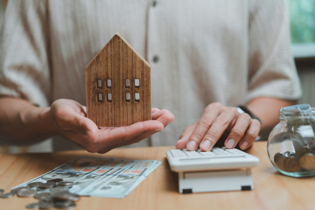 Homeowner reviewing costs of keeping a house as a rental