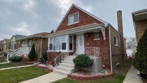 Rental decision Berwyn Cicero homeowner considering whether to sell Canva search keywords: Chicago brick bungalow homeowner house decision rental property