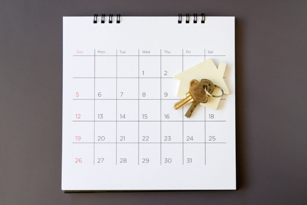 "Calendar and keys used to coordinate shared home showing appointments"