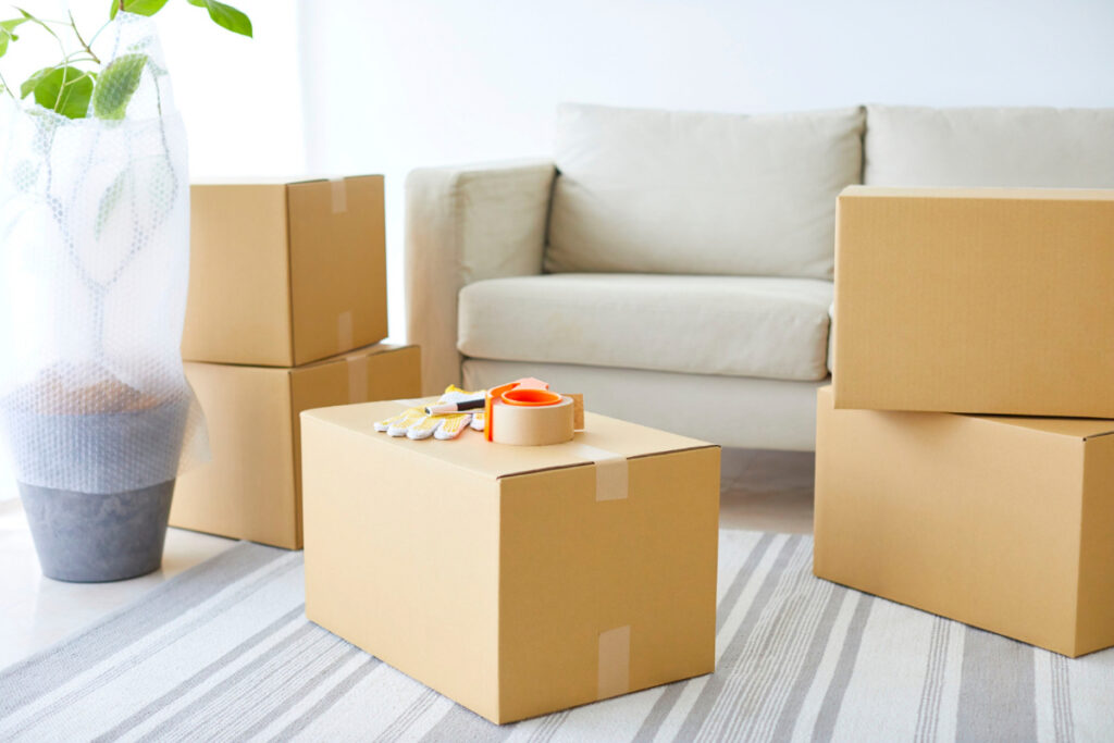 Organized moving boxes and household belongings ready for downsizing.