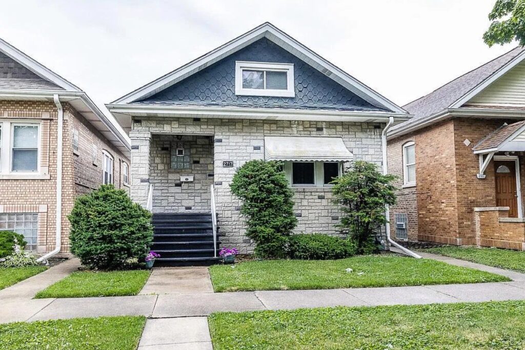 Brick bungalow with exterior features that require ongoing maintenance.